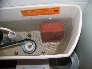 4. Myth: Putting a brick in the toilet tank saves water.